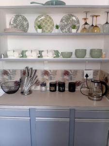 Η κουζίνα ή μικρή κουζίνα στο Kings Lifestyle Apartments, City Retreat