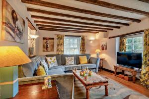 Χώρος καθιστικού στο Pitts Cottage