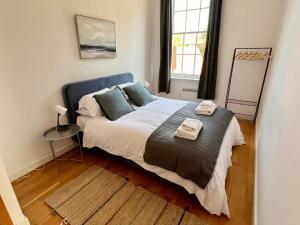 En eller flere senge i et værelse på Fabulous 2 bed in Leiston