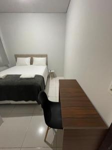 Postel nebo postele na pokoji v ubytování Apartamento em bairro nobre com garagem