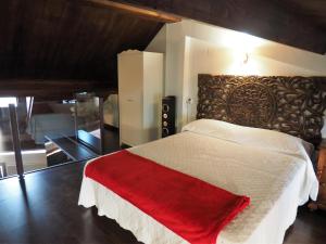 Katil atau katil-katil dalam bilik di Apartamentos 1177