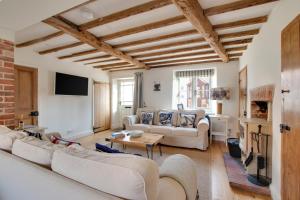 Et opholdsområde på Holly Cottage