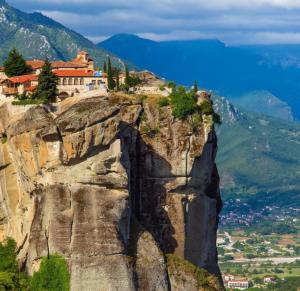 a monastery perched on the side of a mountain at Stelina's Guest House in Trikala in Tríkala