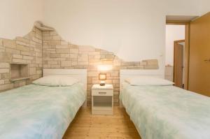 Ένα ή περισσότερα κρεβάτια σε δωμάτιο στο House Salvia