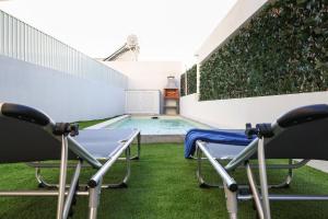 Gambar di galeri bagi Quarto confortável em casa com Piscina di Fernao Ferro