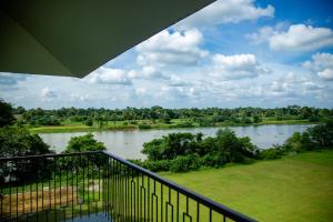 a view of a river from a balcony at The Pavilion at Riverside Park 