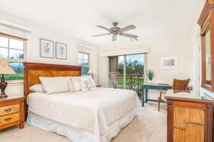 Ένα ή περισσότερα κρεβάτια σε δωμάτιο στο 3 Bed Villa Views Beach Hot Tub Pools Golf