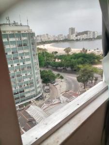 a view from a window of a building and a street at Flet Beira Mar in Rio de Janeiro