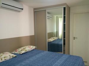 Cama o camas de una habitación en Açai Flat