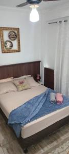 Кровать или кровати в номере Lindo apto frente mar em região privilegiada de Santos +66 фотографий