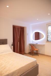Ένα ή περισσότερα κρεβάτια σε δωμάτιο στο Il Coppetto Holiday Home