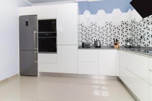 Η κουζίνα ή μικρή κουζίνα στο Duplex Agaete Puerto- terraza y Garage