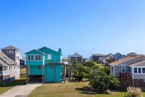 a row of houses in a suburb at 7120 - Twelfth of Never in Nags Head