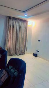 Posezení v ubytování Diamond court estate idu