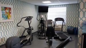 a gym with several exercise bikes in a room at Best Western Plus Kennewick Inn in Kennewick +27 photos