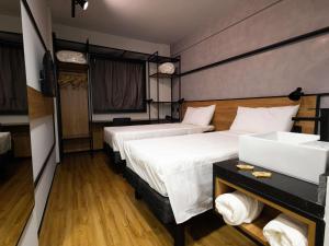 Ένα ή περισσότερα κρεβάτια σε δωμάτιο στο ibis Barra do Garças