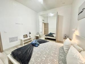 Ένα ή περισσότερα κρεβάτια σε δωμάτιο στο Cotillo Luna en centro, 1 min de la playa, cocina completa y WIFI +10 φωτογραφίες