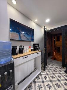 Cuisine ou kitchenette dans l'établissement Signature Boutique Hotel