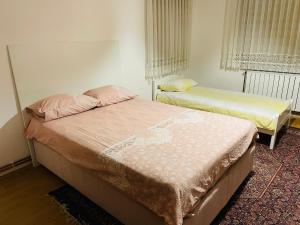 a room with two beds in a room at Apartment Old Town Visoko in Visoko +60 photos