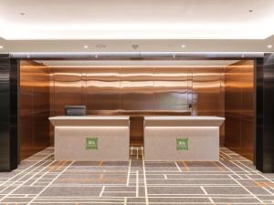 an office with a desk with a laptop on it at ibis Styles Ambassador Jeonju City Centre in Jeonju