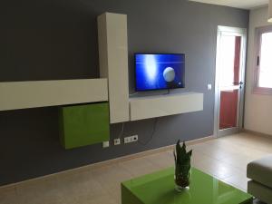 TV a/nebo společenská místnost v ubytování Apartamento Atlántico