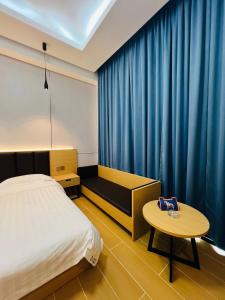 Φωτογραφία από το άλμπουμ του Times Mansion king size standard room στη Φρίταουν +11 φωτογραφίες