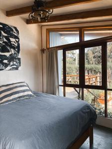 Ένα ή περισσότερα κρεβάτια σε δωμάτιο στο Cabaña Malibu
