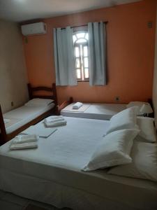 Ένα ή περισσότερα κρεβάτια σε δωμάτιο στο Quarto Praia das Dunas Braga