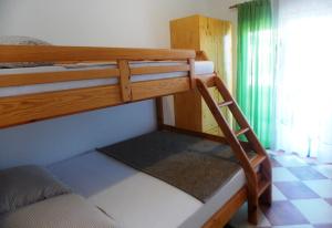 Postel nebo postele na pokoji v ubytování Apartments Lalić