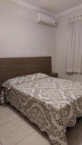 Postel nebo postele na pokoji v ubytování apart 1 inteiro Área nobre, 2 quartos e completo 135 m2