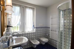 Kúpeľňa v ubytovaní Hotel Serenella