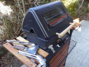 a grill with a bunch of tools on a table at Sun Terrace Hakone in Hakone