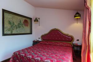 Posteľ alebo postele v izbe v ubytovaní Hotel Serenella