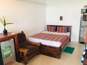 Giường trong phòng chung tại The Sea Sun villa