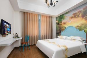 Ένα ή περισσότερα κρεβάτια σε δωμάτιο στο 微漾小筑主题客栈 +22 φωτογραφίες