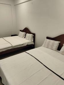 En eller flere senge i et værelse på Windy MOUNTAIN + 3 billeder