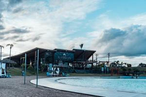 a water park with a pool and a pavilion at Mar Adentro casa 9 in Santa Cruz de la Sierra