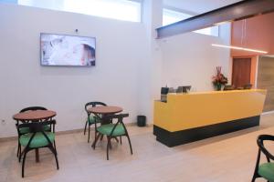 TV a/nebo společenská místnost v ubytování Slim Pajuçara by Tropicalis