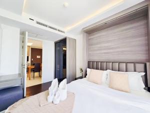 Ένα ή περισσότερα κρεβάτια σε δωμάτιο στο Circle REIN Sukhumvit 12 Bangkok
