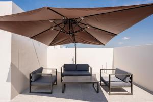 Posezení v ubytování hiii Aura Pool Villa Hotel Pattaya Central