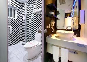 Koupelna v ubytování NL Concept Hotel