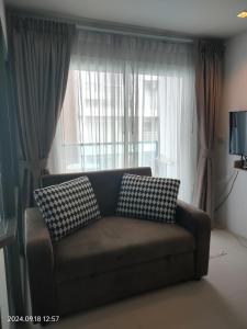 Khu vực ghế ngồi tại Deluxe Condo Mae Pim - Grand Blue Resort Rayong