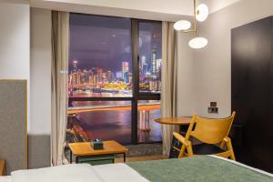 Fotografie z fotogalerie ubytování From 高空江景酒店-江北嘴金融城北滨路店 v destinaci Čchung-čching