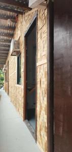 a building is being constructed with an open door at Silid Siargao in General Luna