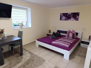 Katil atau katil-katil dalam bilik di Ferien- Monteurwohnung bis 6 Personen