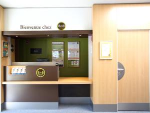 Vestibiulis arba registratūra apgyvendinimo įstaigoje B&B HOTEL Villeneuve Loubet Plage