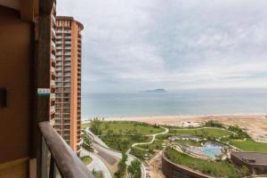 a view of the ocean from a building at Mangrove Tree Resort World Qingdao in Huangdao