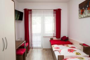 Katil atau katil-katil dalam bilik di Accommodation Resman