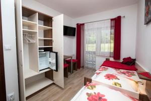 Katil atau katil-katil dalam bilik di Accommodation Resman