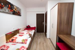 Katil atau katil-katil dalam bilik di Accommodation Resman